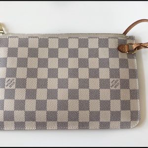 Louis Vuitton Damier Azur Canvas wristlet.